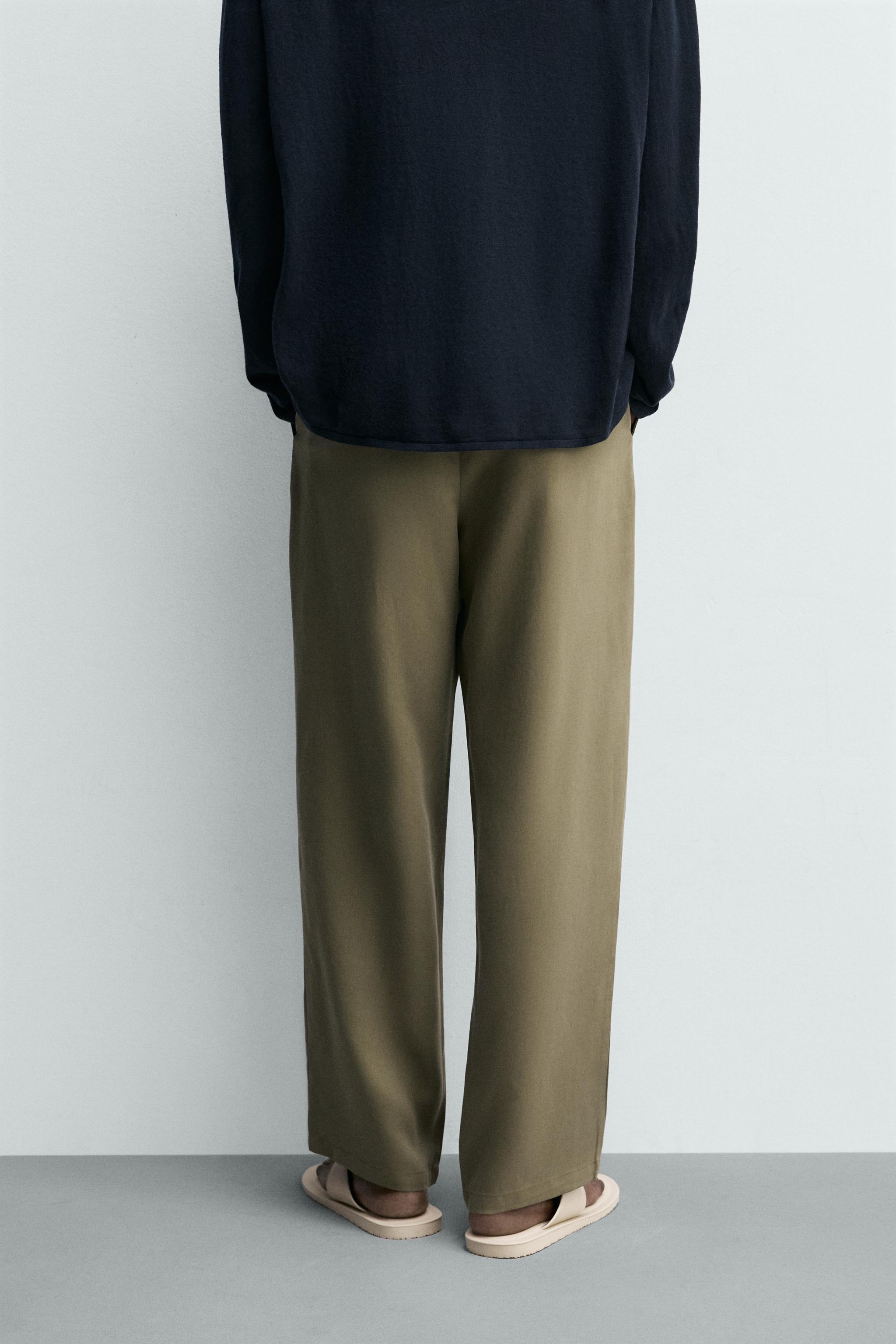RELAXED FIT FLOWY PANTS